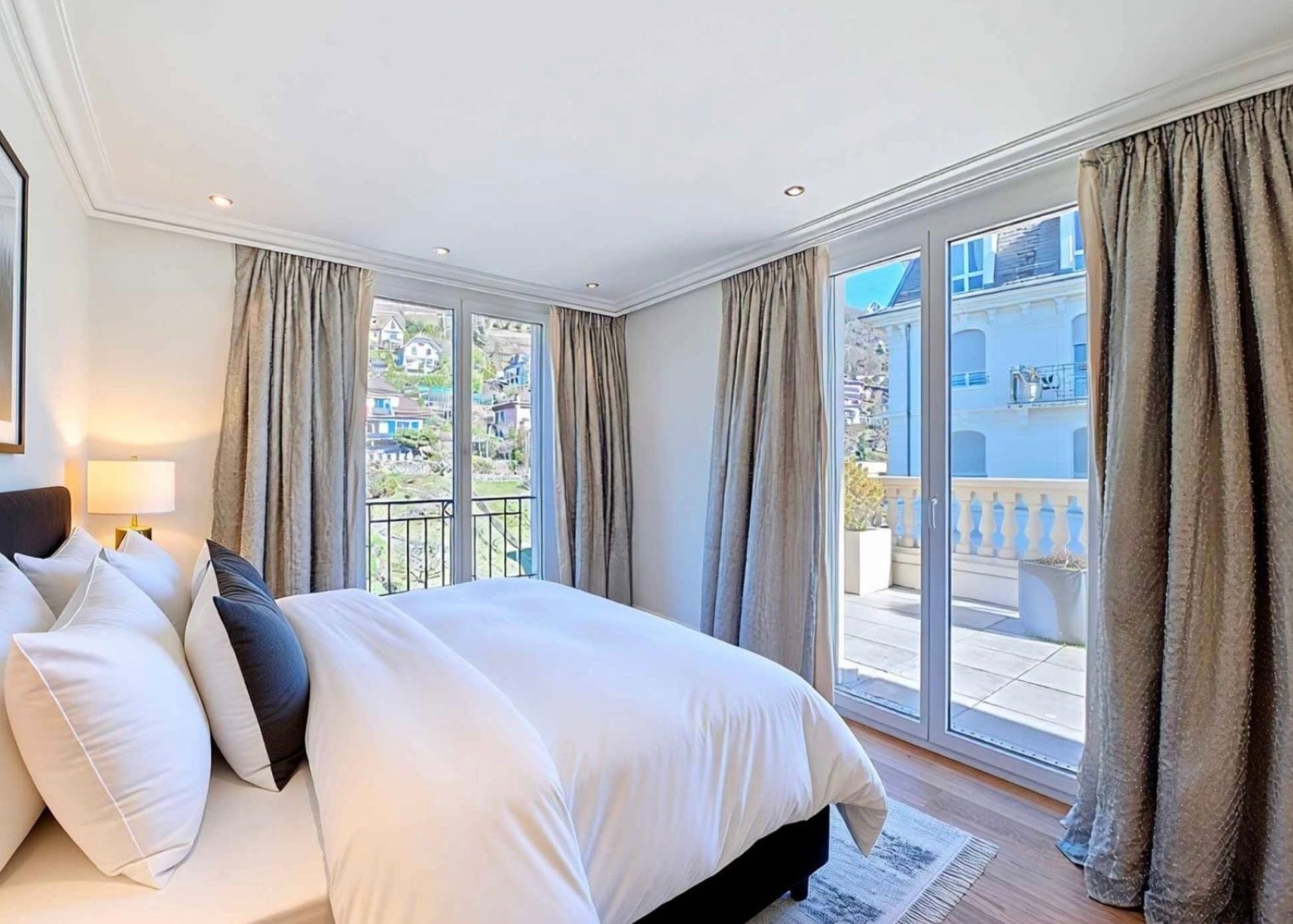 Elegant living room with fireplace and access to the terrace, Château Belmont Montreux