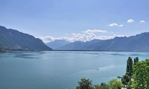 Panoramic view of Lake Geneva and the Swiss Alps from Le National, Montreux