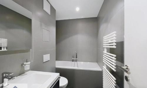 Bathroom with bathtub and premium finishes, Le National Montreux