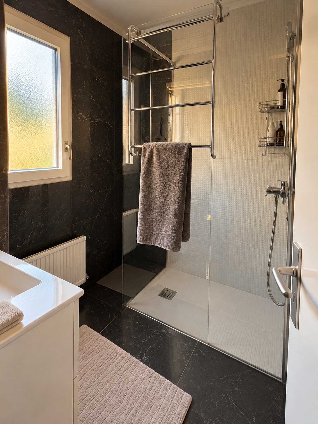 Shower room with black marble walls